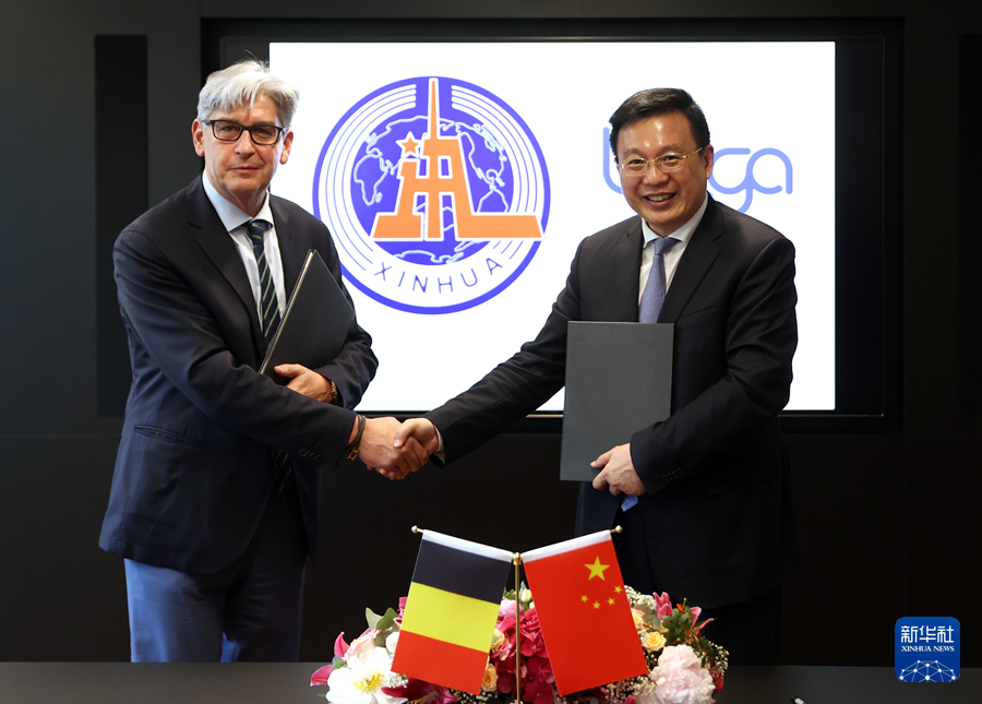 傅华会见比利时通讯社社长